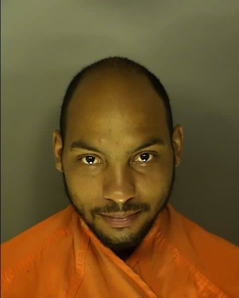 Booking photo of RAYMOND DIONJRA HAWKINS
